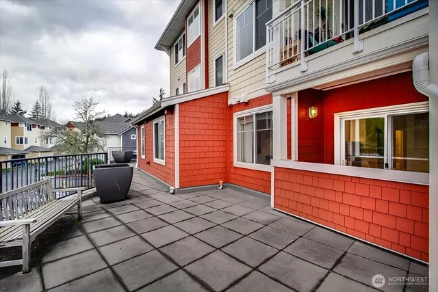 a view of a terrace with sitting area