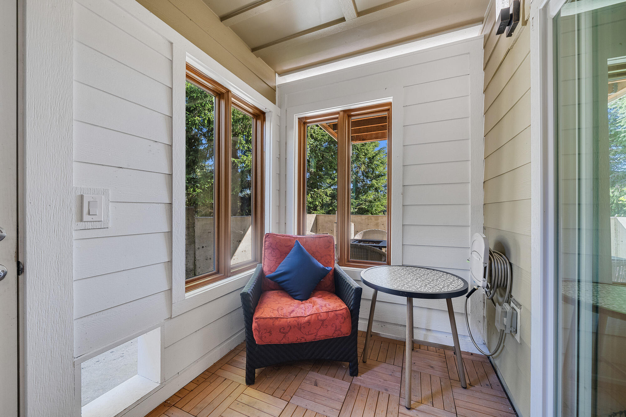 13150 D Street Nehalem, OR 97131 - Photo 17 of 29 a outdoor space with a couch and a potted plant