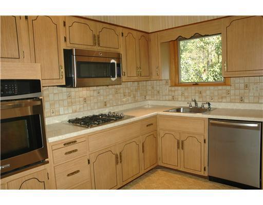 1605 Powers Run Road Pittsburgh, PA 15238 - Photo 6 of 18 Kitchen. This functional 13x9 kitchen has a new dishwasher, microwave oven and electric stove.