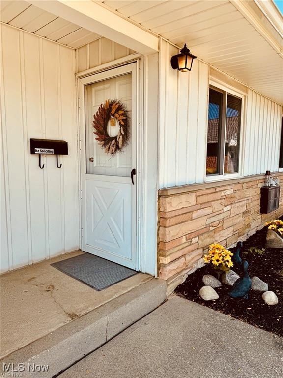 5651 Broadview Road, Unit B4 Cleveland, OH 44134 - Photo 1 of 19 View of exterior entry featuring stone siding