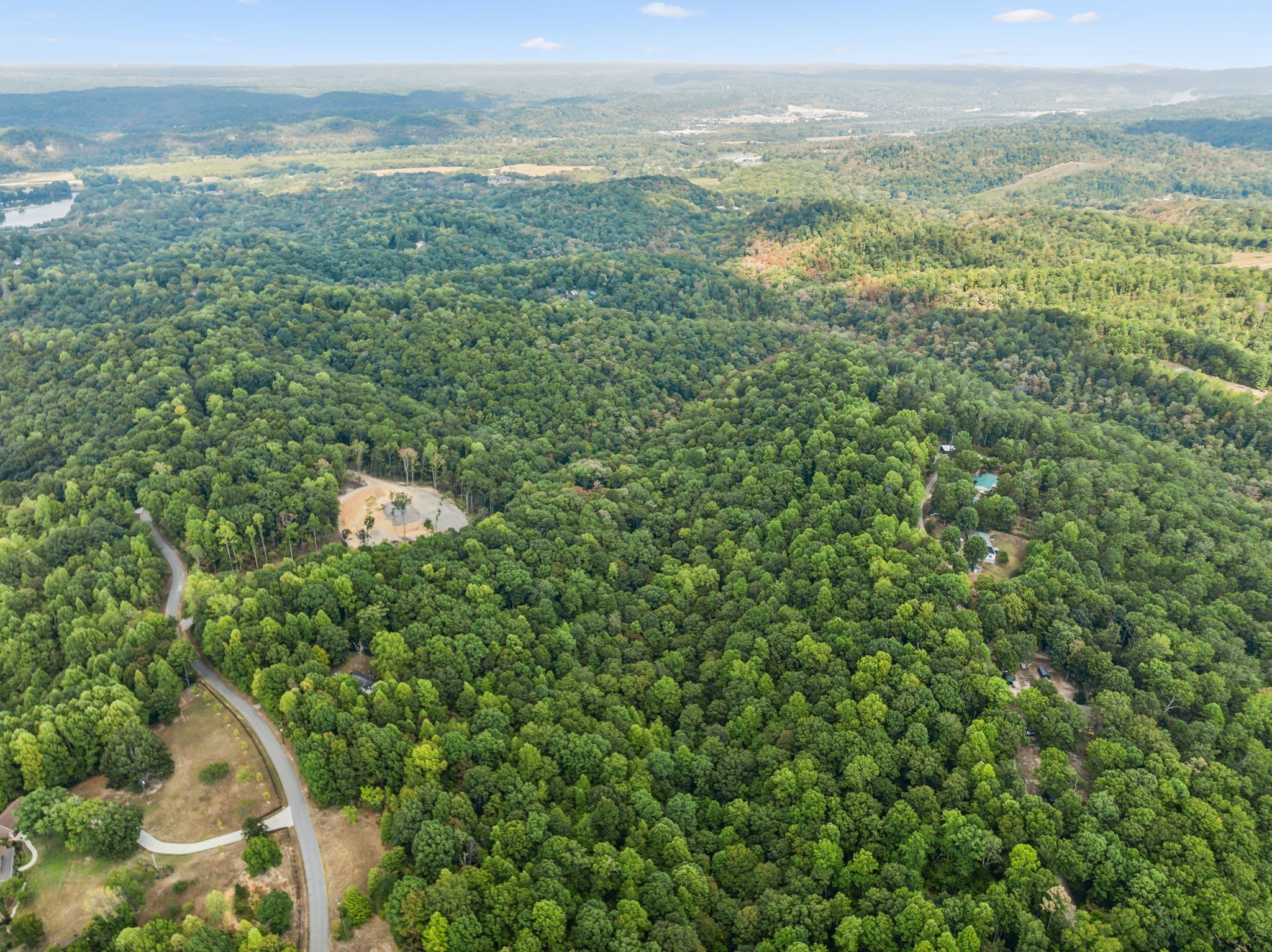 0 Gibbs Road Ashland City, TN 37015 - Photo 20 of 23 a view of a city with lush green forest