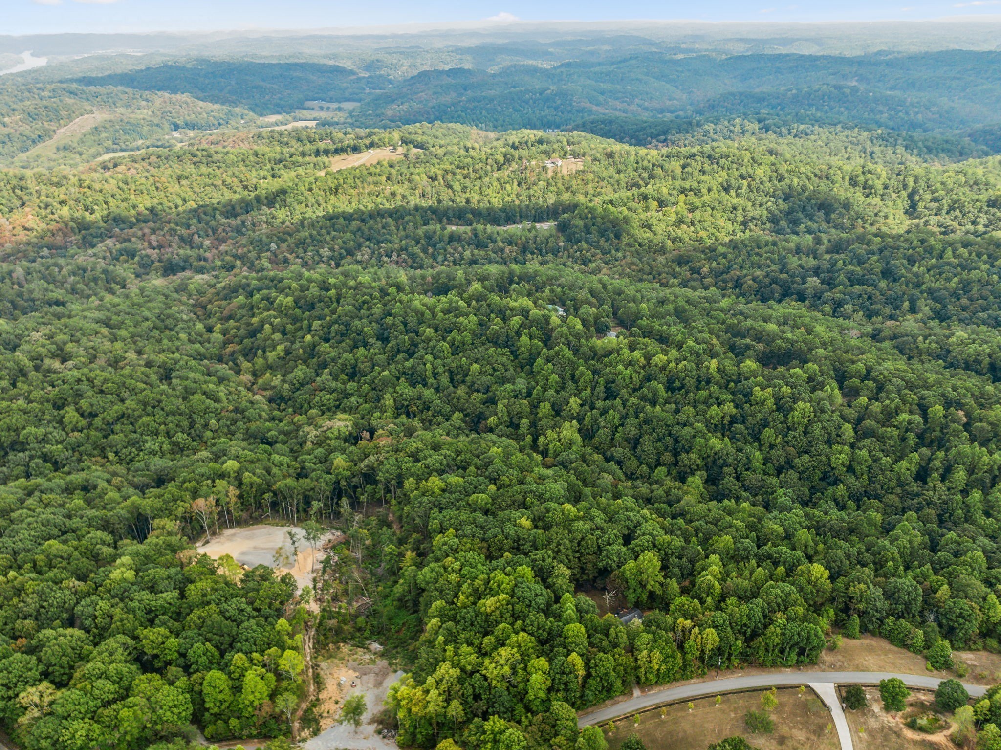 0 Gibbs Road Ashland City, TN 37015 - Photo 21 of 23 a view of a lake with a yard