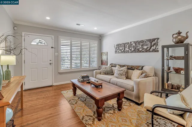 a living room with furniture and window