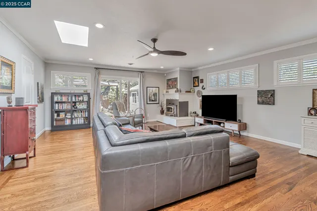 a kitchen with stainless steel appliances a stove sink and cabinets