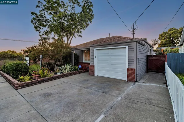 a view of a house with a garage