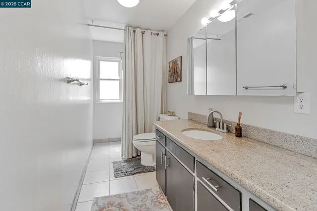 a room with a table and chairs