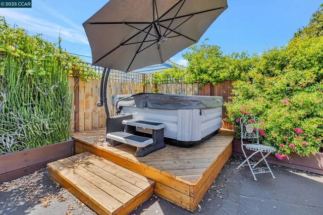 a swimming pool with outdoor seating and patio