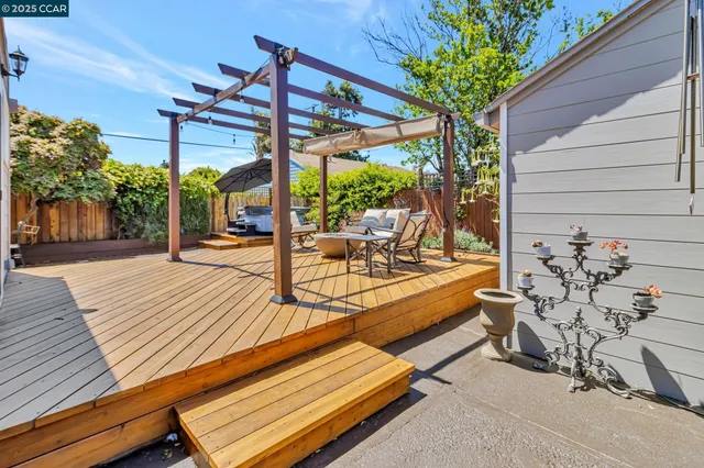 a view of a patio with chairs and tables