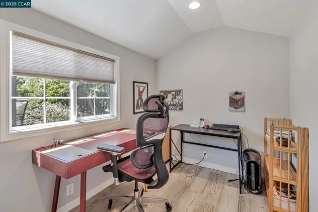 a room with furniture and a book shelf