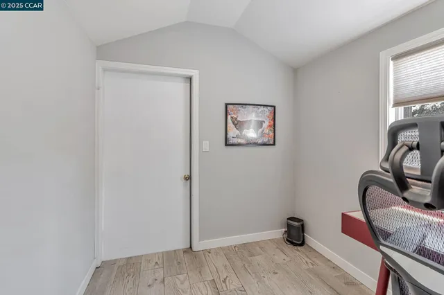 a backyard of a house with outdoor seating