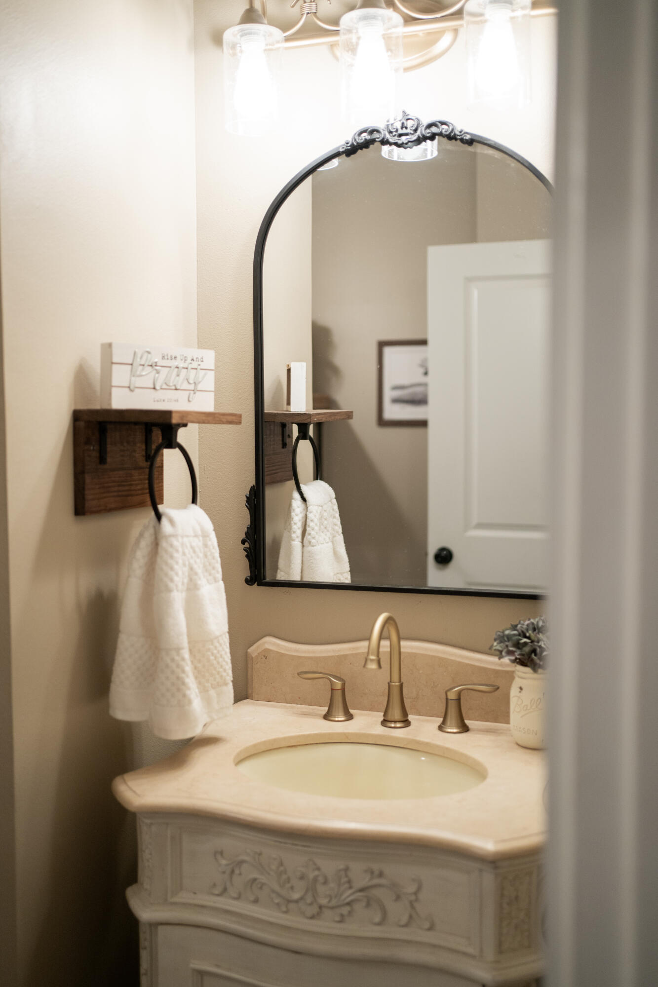 5485 Old River Road Baker, FL 32531 - Photo 26 of 48 a bathroom with a sink and a mirror