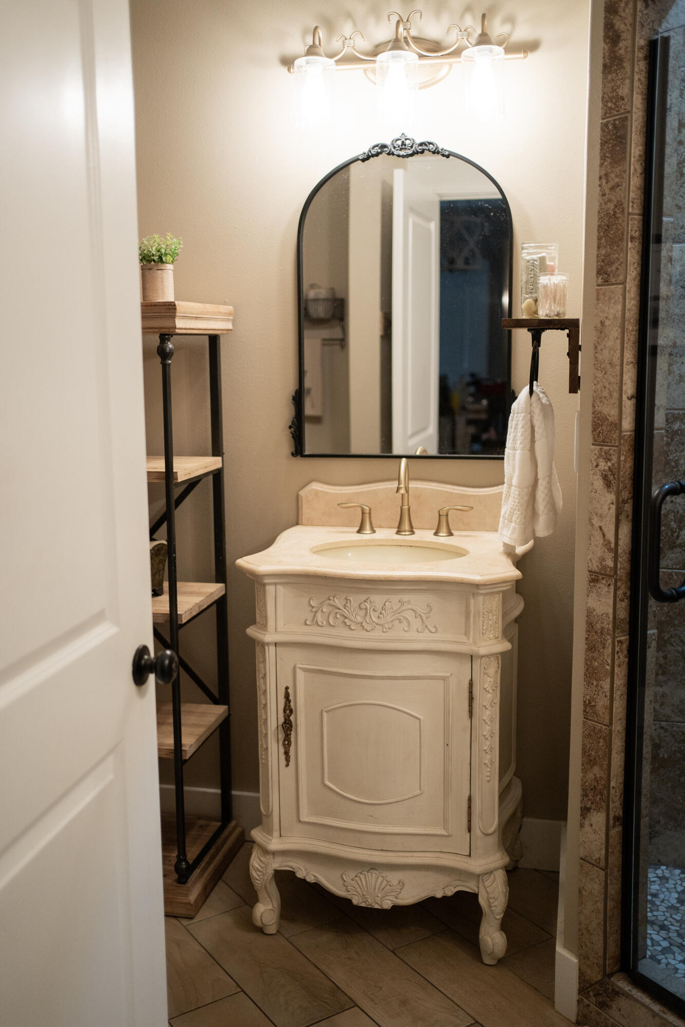 5485 Old River Road Baker, FL 32531 - Photo 28 of 48 a bathroom with a sink vanity and a mirror