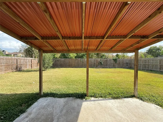 a view of a swimming pool with an outdoor space