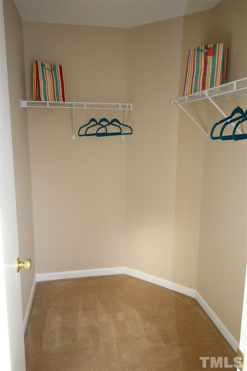 2411 Quarry Ridge Lane Raleigh, NC 27610 - Photo 17 of 22 a view of a closet with storage