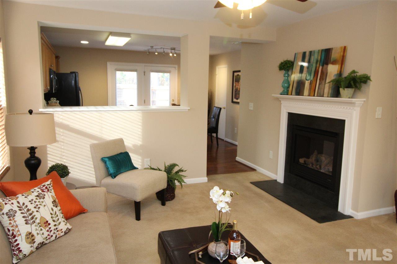 2411 Quarry Ridge Lane Raleigh, NC 27610 - Photo 6 of 22 a living room with furniture and a fireplace