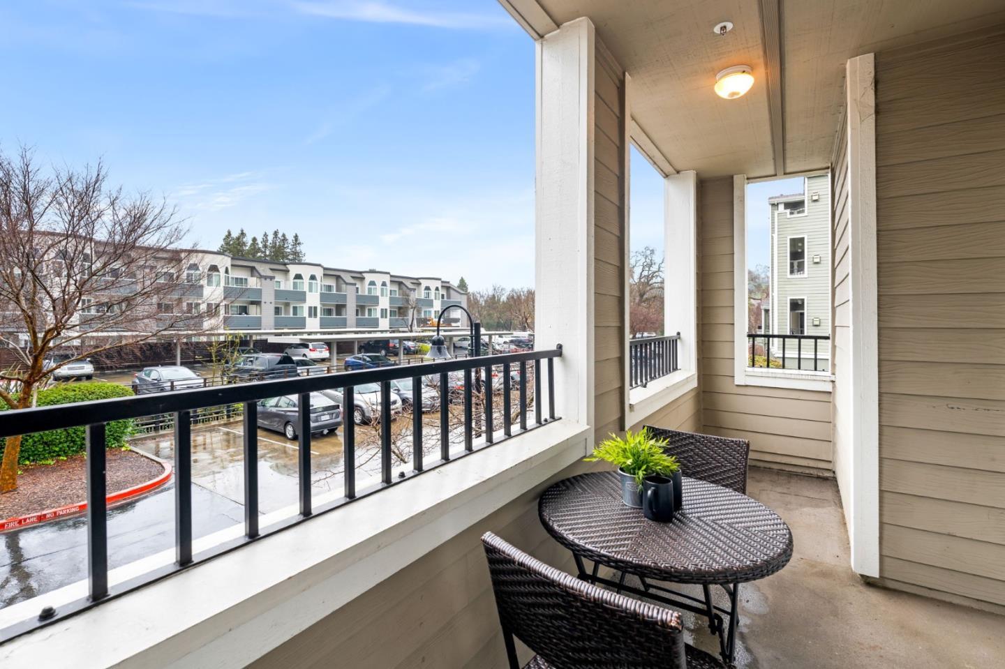 852 Diablo Avenue, Unit 104 Novato, CA 94947 - Photo 23 of 23 a view of a balcony with a table and chairs