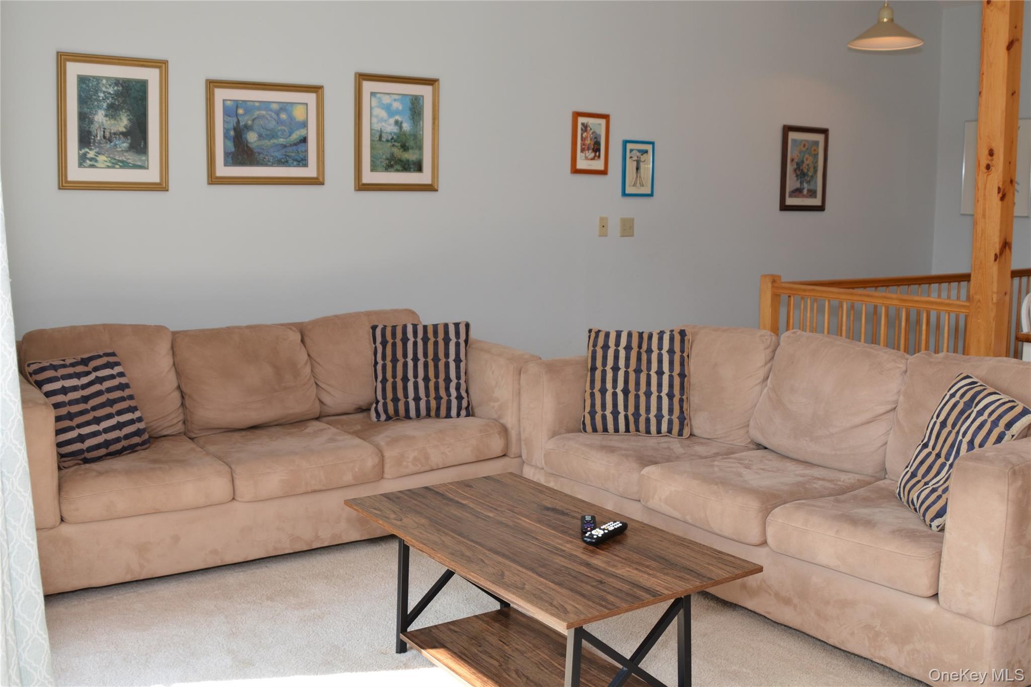 79 Windham Ridge Road, Unit 17A Windham, NY 12496 - Photo 7 of 18 a living room with a couch