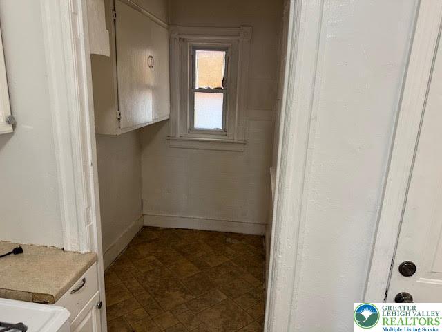 208 Ridge Avenue Allentown, PA 18102 - Photo 7 of 17 a bathroom with a sink and a mirror