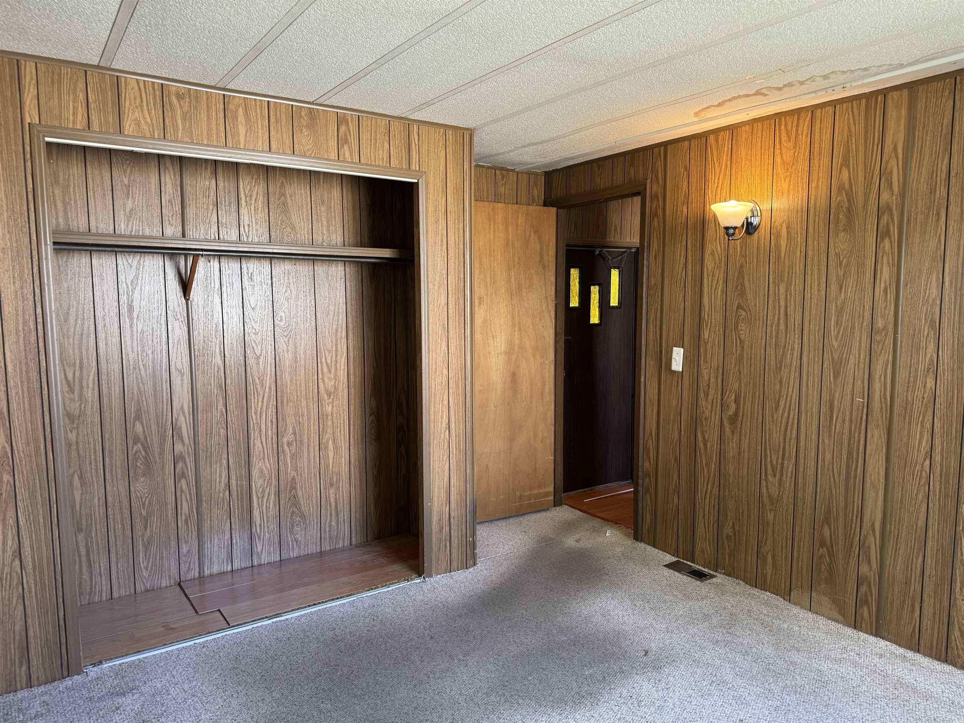 585-25 25 1/2 Road, Unit 215 Grand Junction, CO 81505 - Photo 11 of 15 a view of a room with a wooden walls