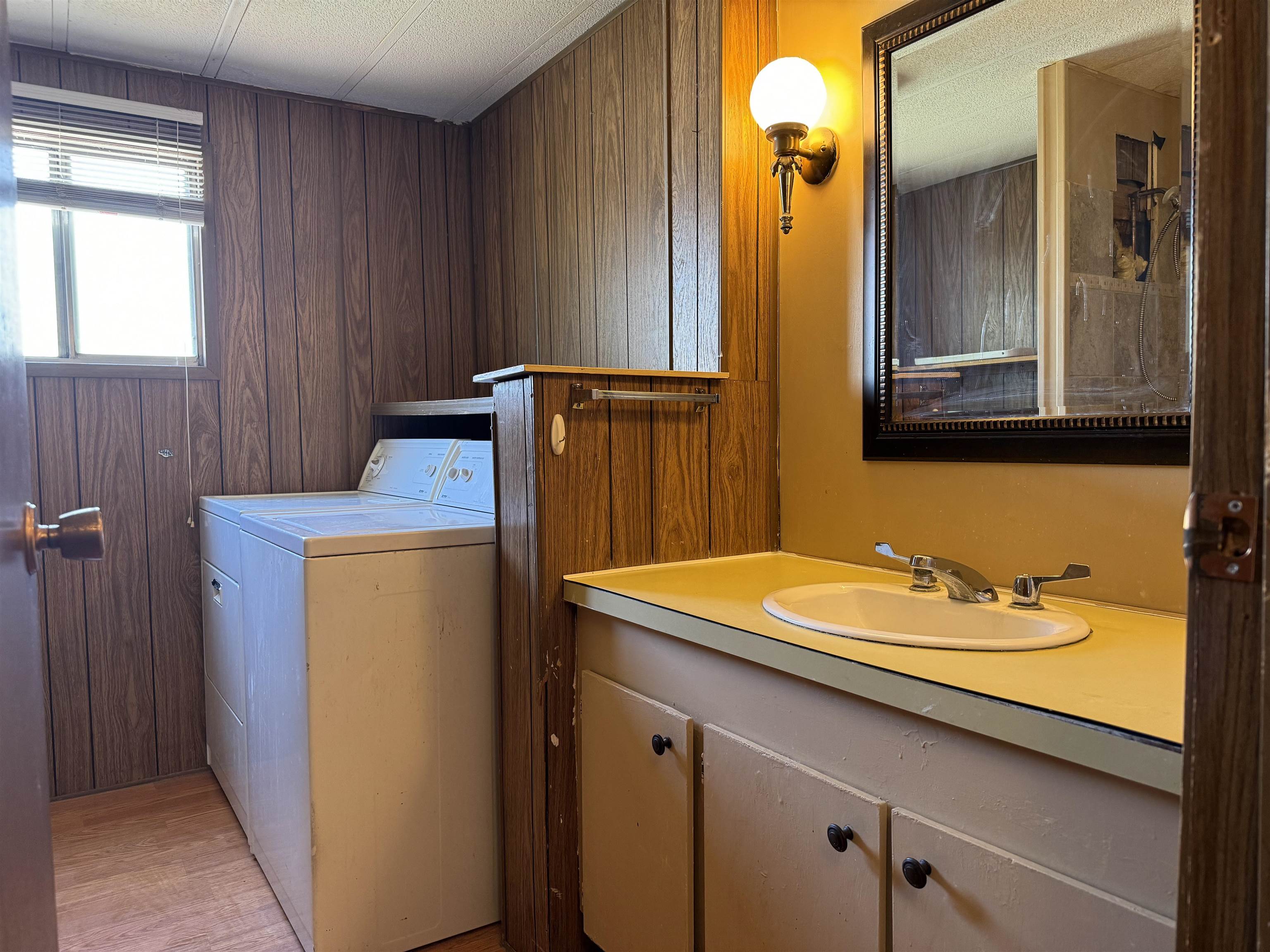 585-25 25 1/2 Road, Unit 215 Grand Junction, CO 81505 - Photo 12 of 15 a bathroom with a sink and a mirror