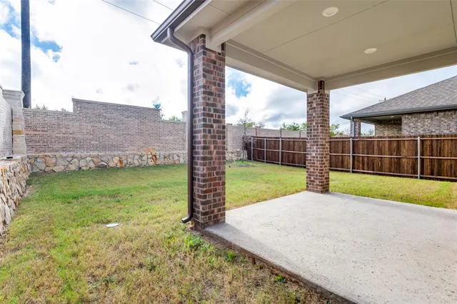 a brick house with a outdoor space