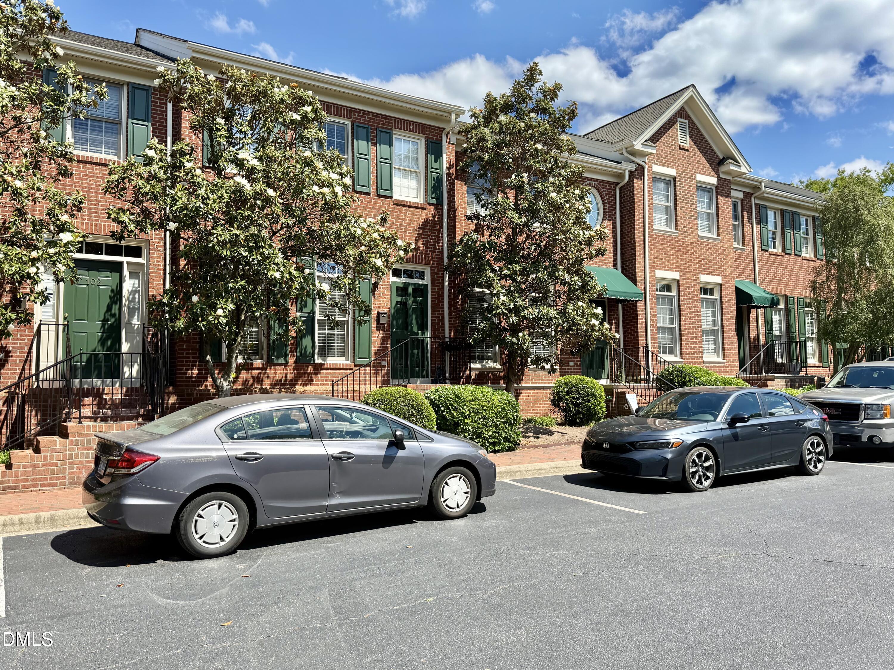 106 Hatfield Lane Raleigh, NC 27603 - Photo 25 of 29 a car parked in front of a house