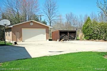 1750 Sand Road Port Austin, MI 48467 - Photo 21 of 25 1750SandRdWoodshed.jpg