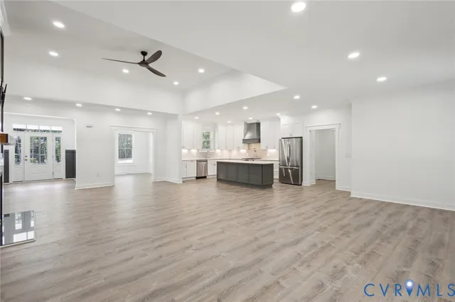 a view of a sink and cabinets