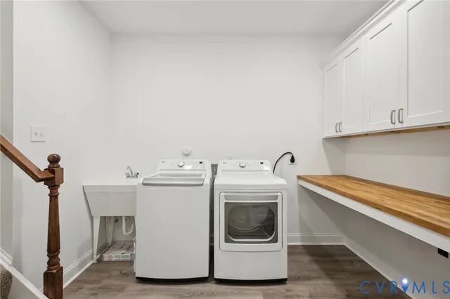 an empty room with a window and a ceiling fan
