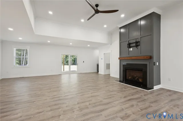 a kitchen with stainless steel appliances granite countertop a sink a stove a refrigerator and a oven