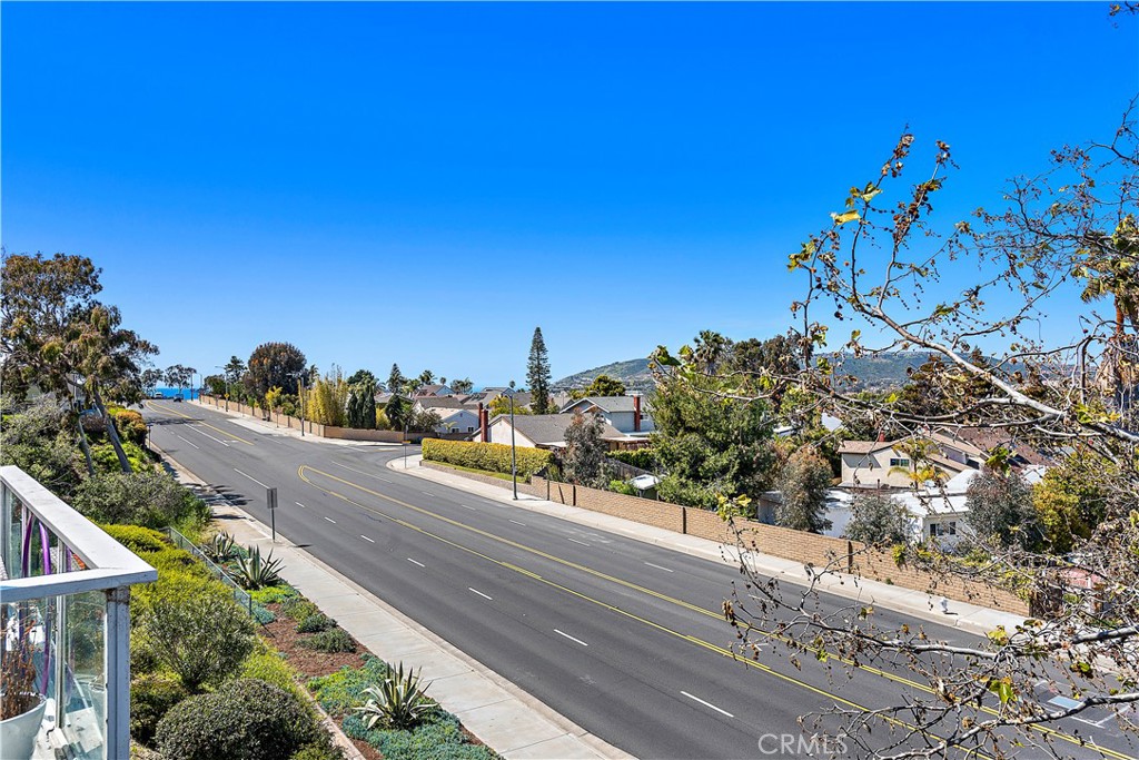 24451 Lantern Hill Drive, Unit D Dana Point, CA 92629 - Photo 17 of 32 a view of a city street with a street view