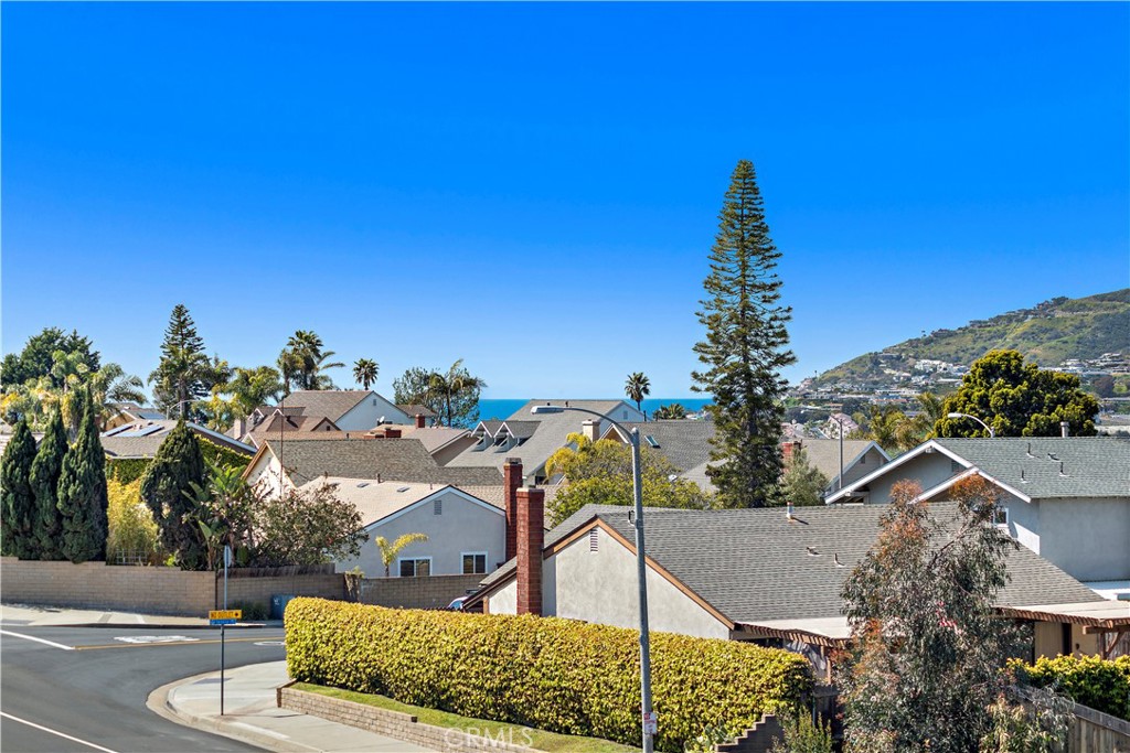 24451 Lantern Hill Drive, Unit D Dana Point, CA 92629 - Photo 18 of 32 a view of a house with a street