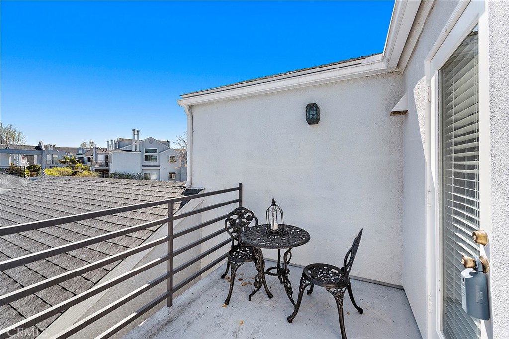 24451 Lantern Hill Drive, Unit D Dana Point, CA 92629 - Photo 20 of 32 a view of a chairs and table in the balcony