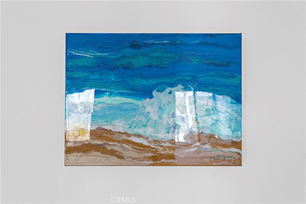 24451 Lantern Hill Drive, Unit D Dana Point, CA 92629 - Photo 29 of 32 a view of a room with a wooden floor