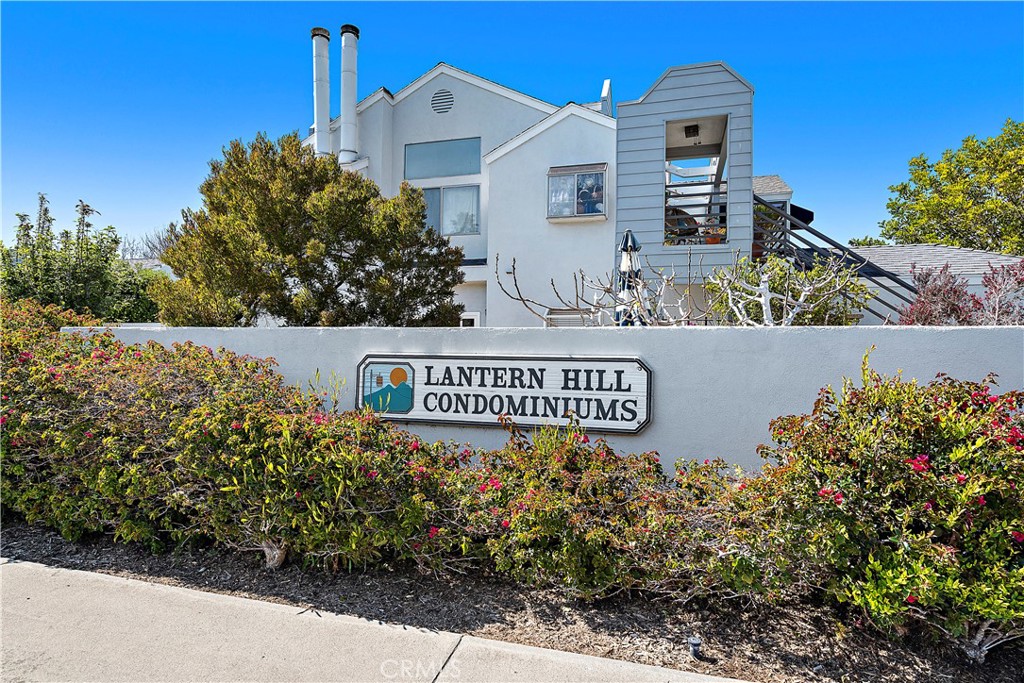 24451 Lantern Hill Drive, Unit D Dana Point, CA 92629 - Photo 5 of 32 a sign on the side of a building