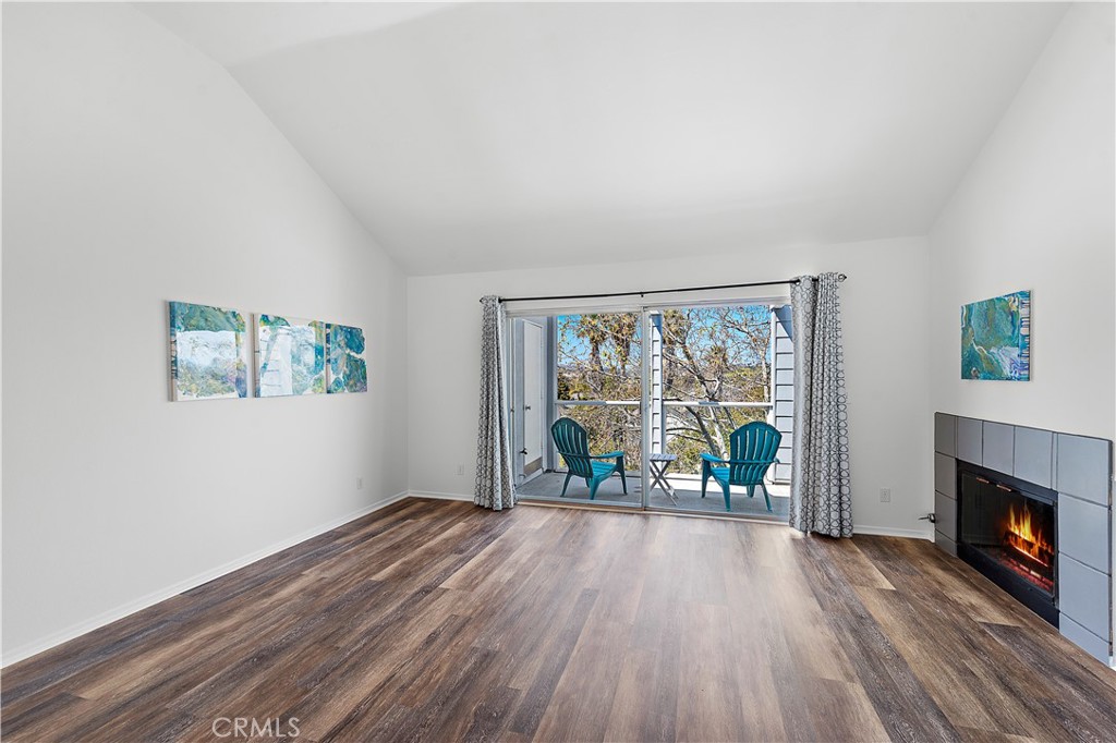 24451 Lantern Hill Drive, Unit D Dana Point, CA 92629 - Photo 32 of 32 wooden floor in an empty room with a window