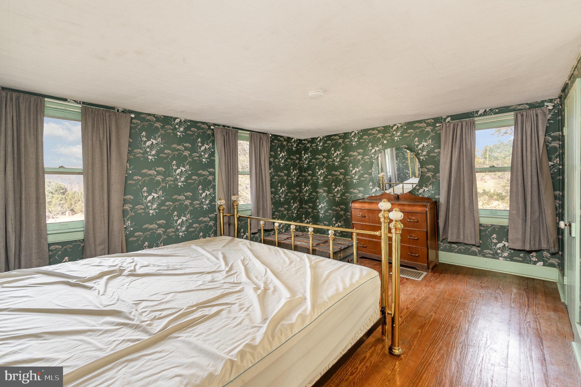 5446 Stambaugh Road Spring Grove, PA 17362 - Photo 17 of 28 Charming bedroom with vintage floral accents.