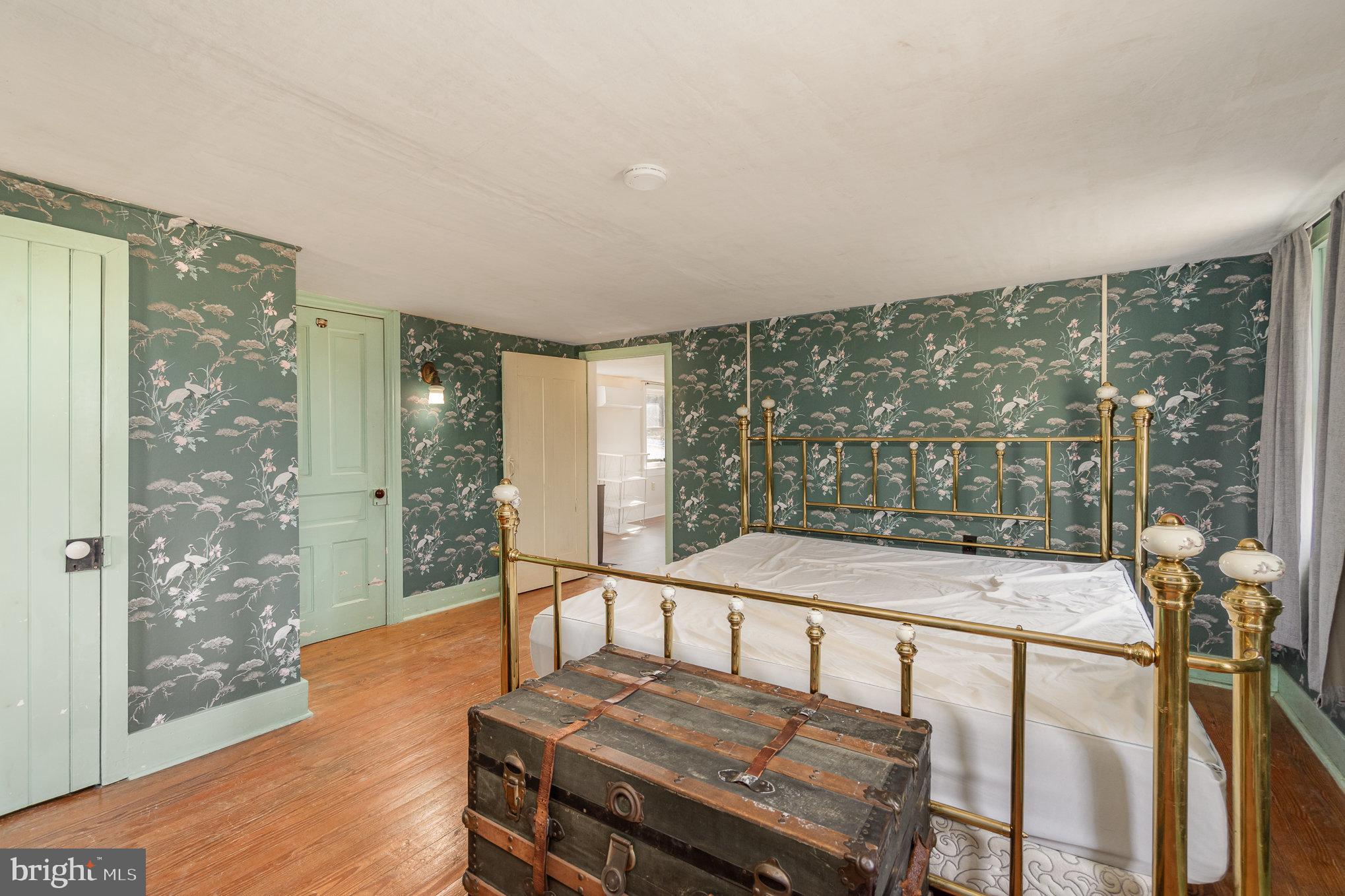 5446 Stambaugh Road Spring Grove, PA 17362 - Photo 18 of 28 Charming vintage bedroom with floral accents.