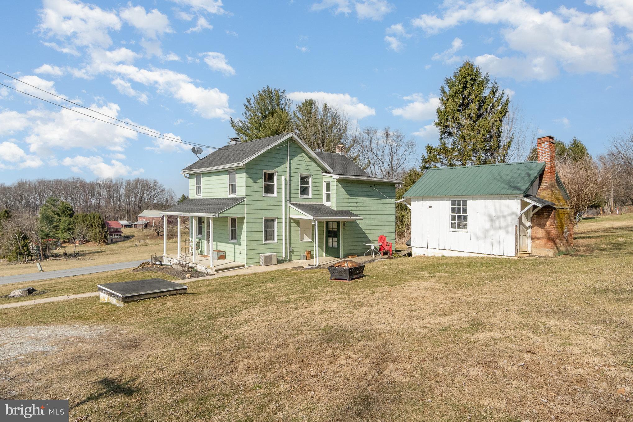 5446 Stambaugh Road Spring Grove, PA 17362 - Photo 5 of 28 Charming green farmhouse with scenic views.
