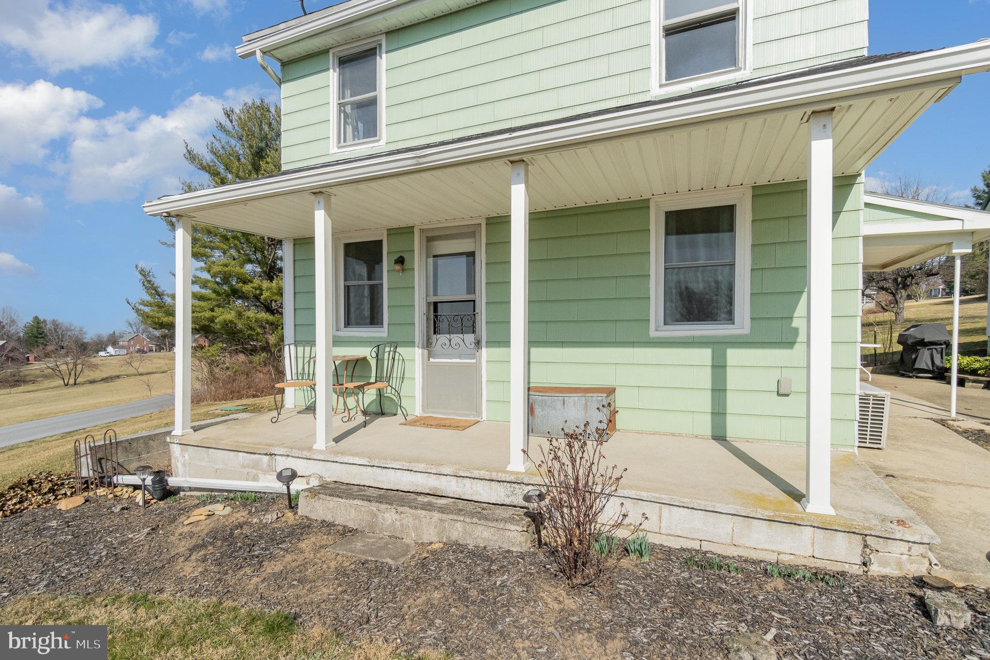 5446 Stambaugh Road Spring Grove, PA 17362 - Photo 7 of 28 Charming green home with inviting porch.
