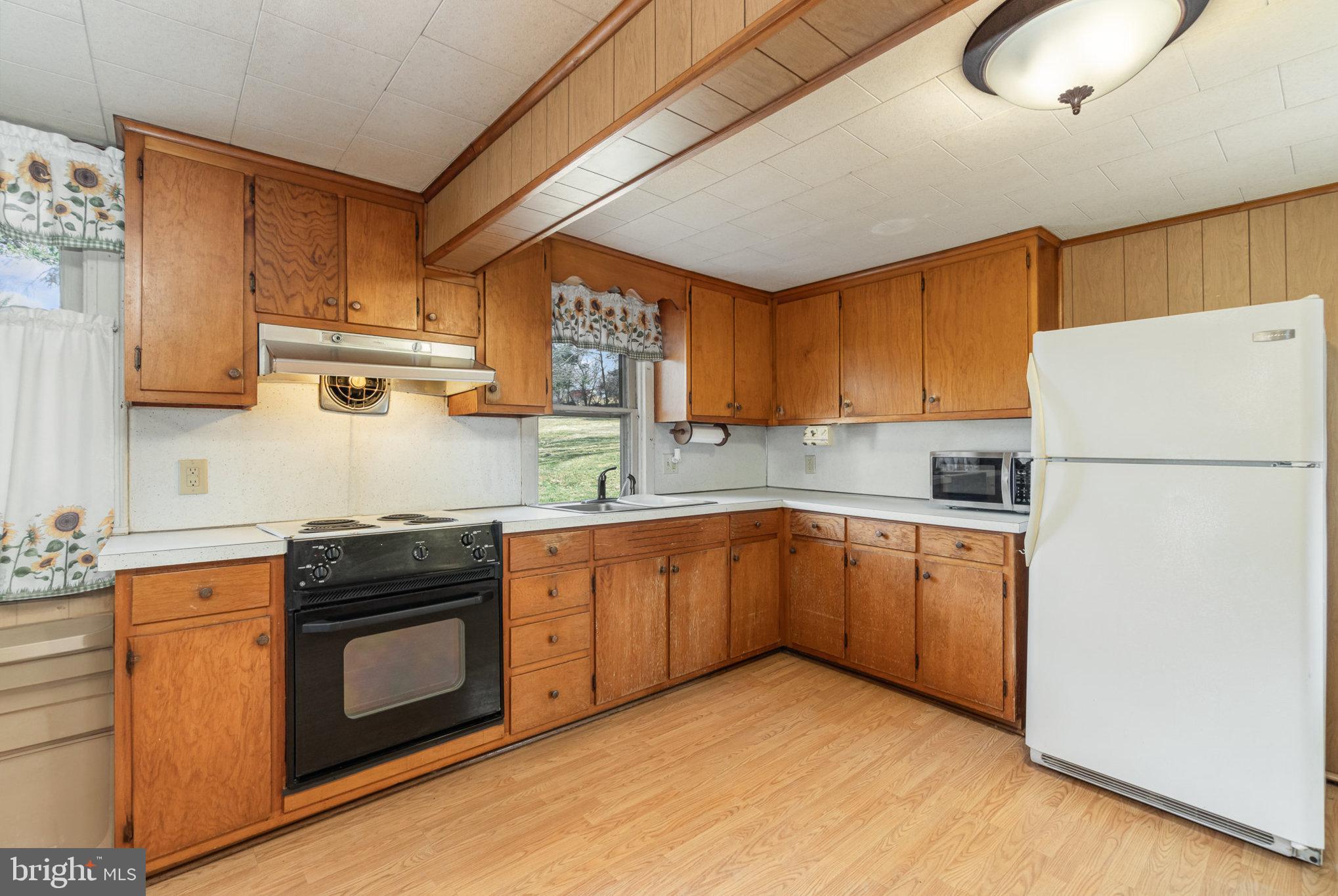 5446 Stambaugh Road Spring Grove, PA 17362 - Photo 10 of 28 Charming kitchen with warm wooden tones.