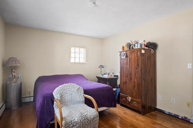 a bedroom with a bed and a closet