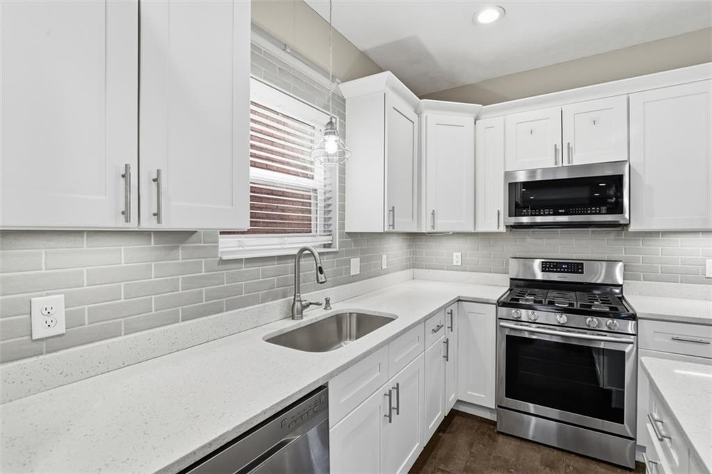 650 Southern Avenue Pittsburgh, PA 15211 - Photo 13 of 27 Stainless appliances, quartz countertops, and white shaker cabinets!