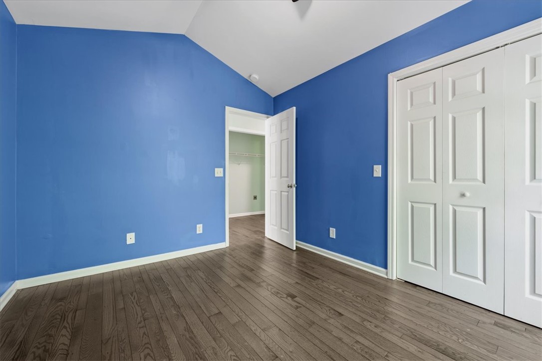 210 Briarcliff Road Central, SC 29630 - Photo 16 of 39 This spacious bedroom features beautiful hardwood floors and convenient closet access.