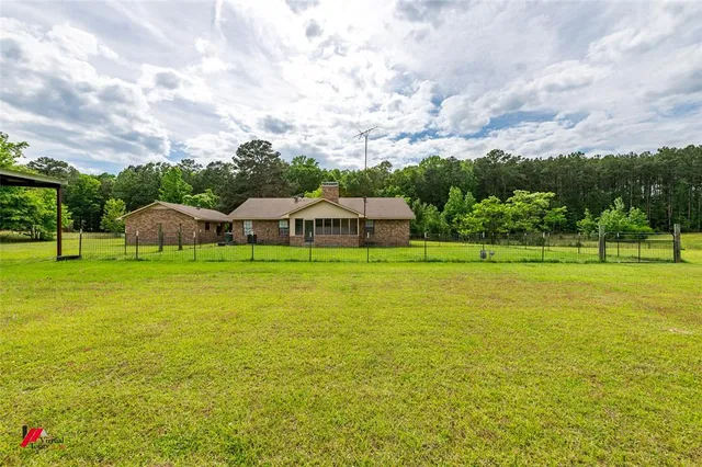 a view of an outdoor space with swimming pool