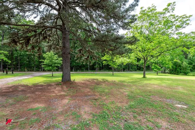 a view of a house with a big yard