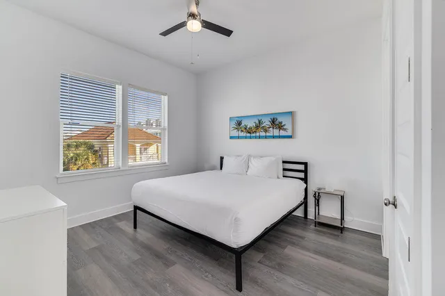 a view of kitchen with sink and wooden floor