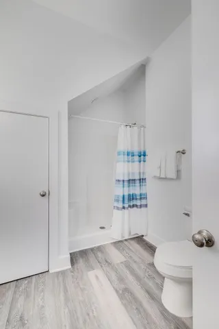 a bedroom with a bed and a table