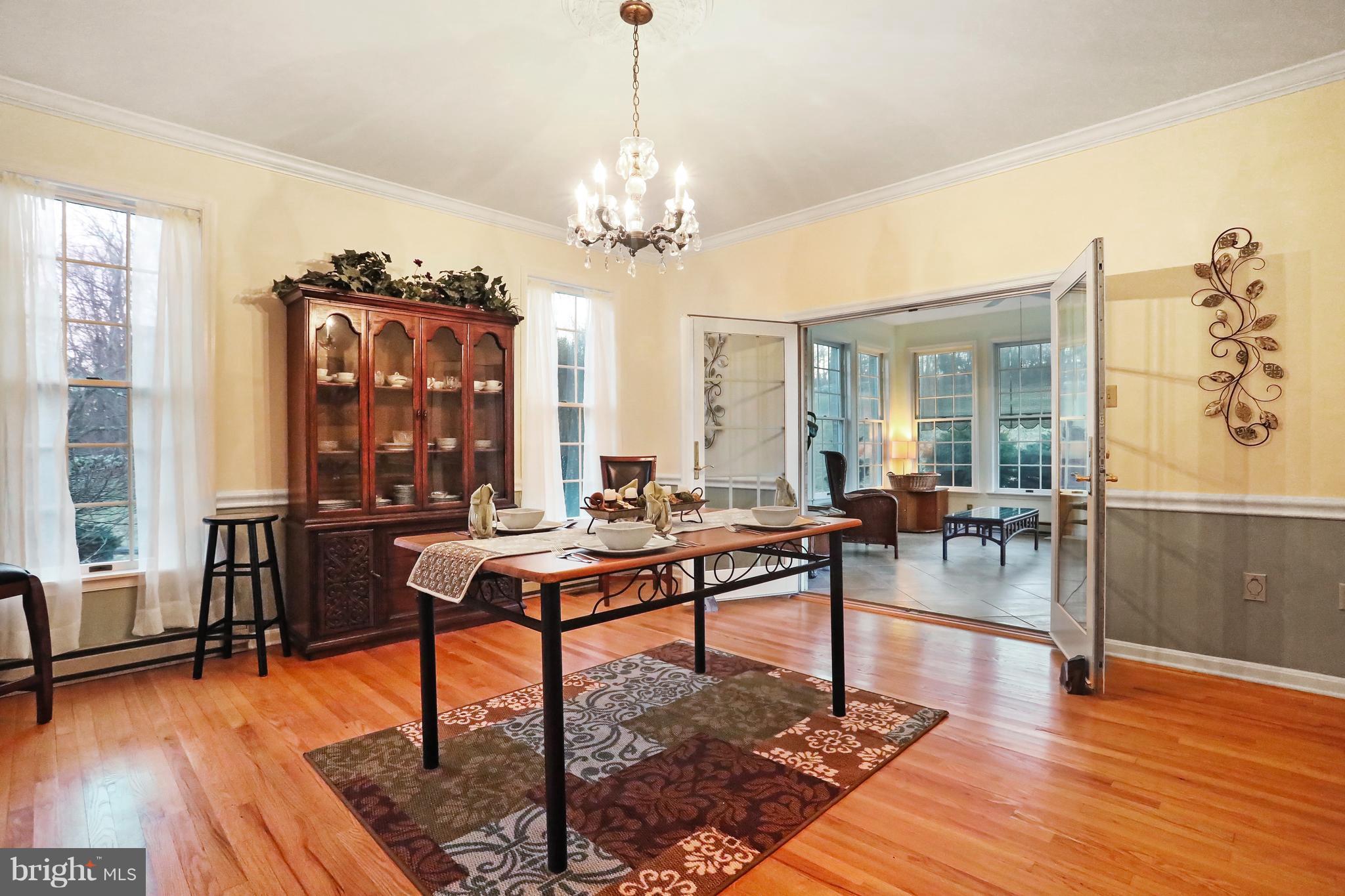 24556 Raven Rock Road Smithsburg, MD 21783 - Photo 6 of 30 Formal DR w/ french doors to all all seasons room