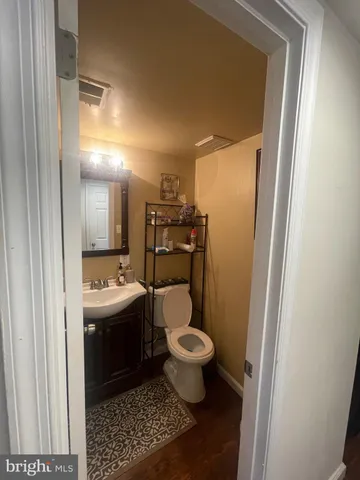 a bathroom with a sink and a toilet